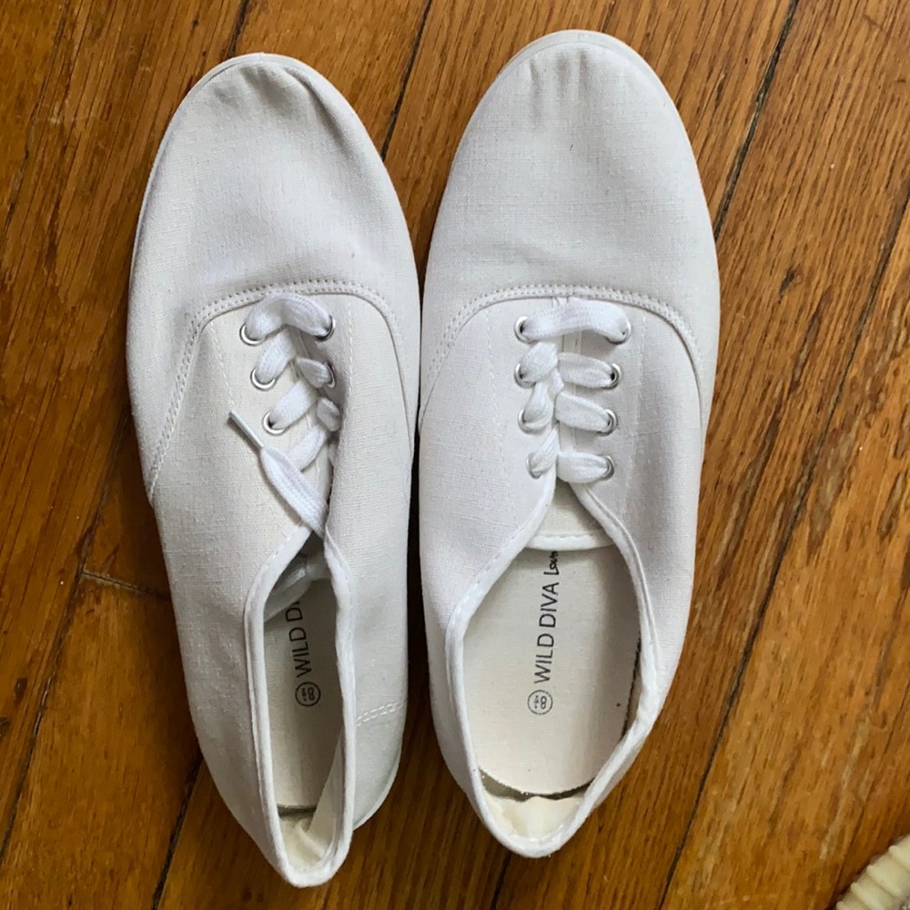 Plain white sneakers